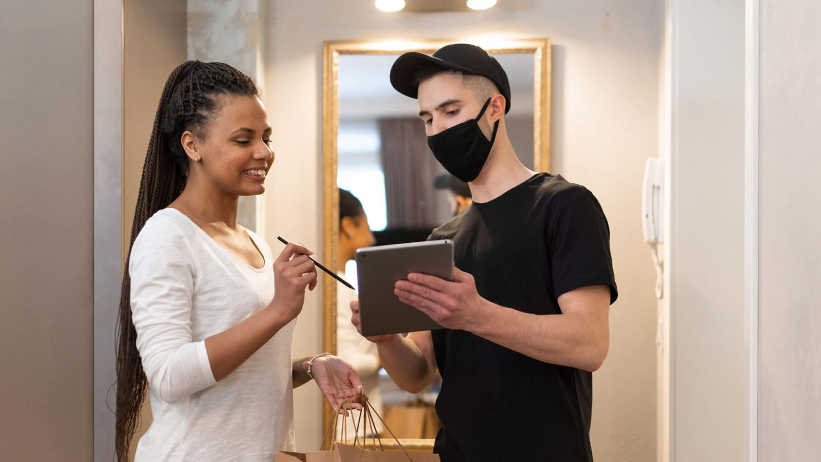 A manager signs for her business expenses